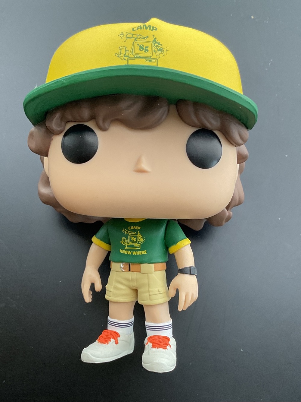 Funko Dustin Pop! with Yellow & Green Camp Hat and Green Tee